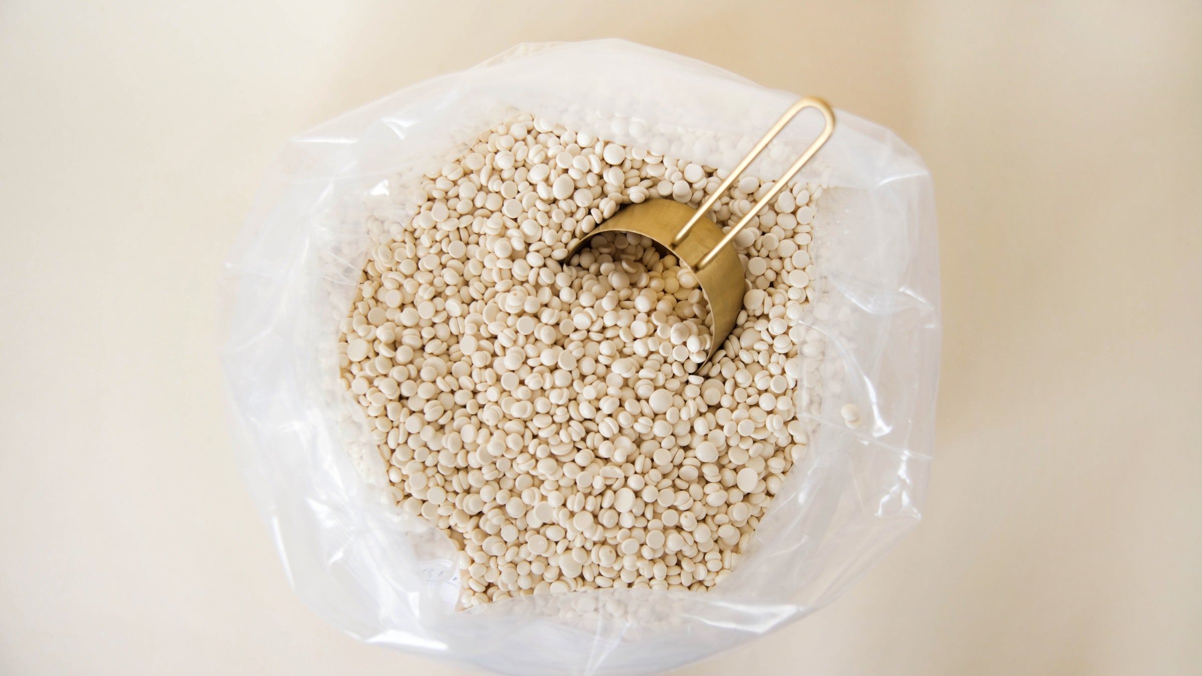 Creamy White Cirepil Escential Rose Hard Wax Bulk Bag